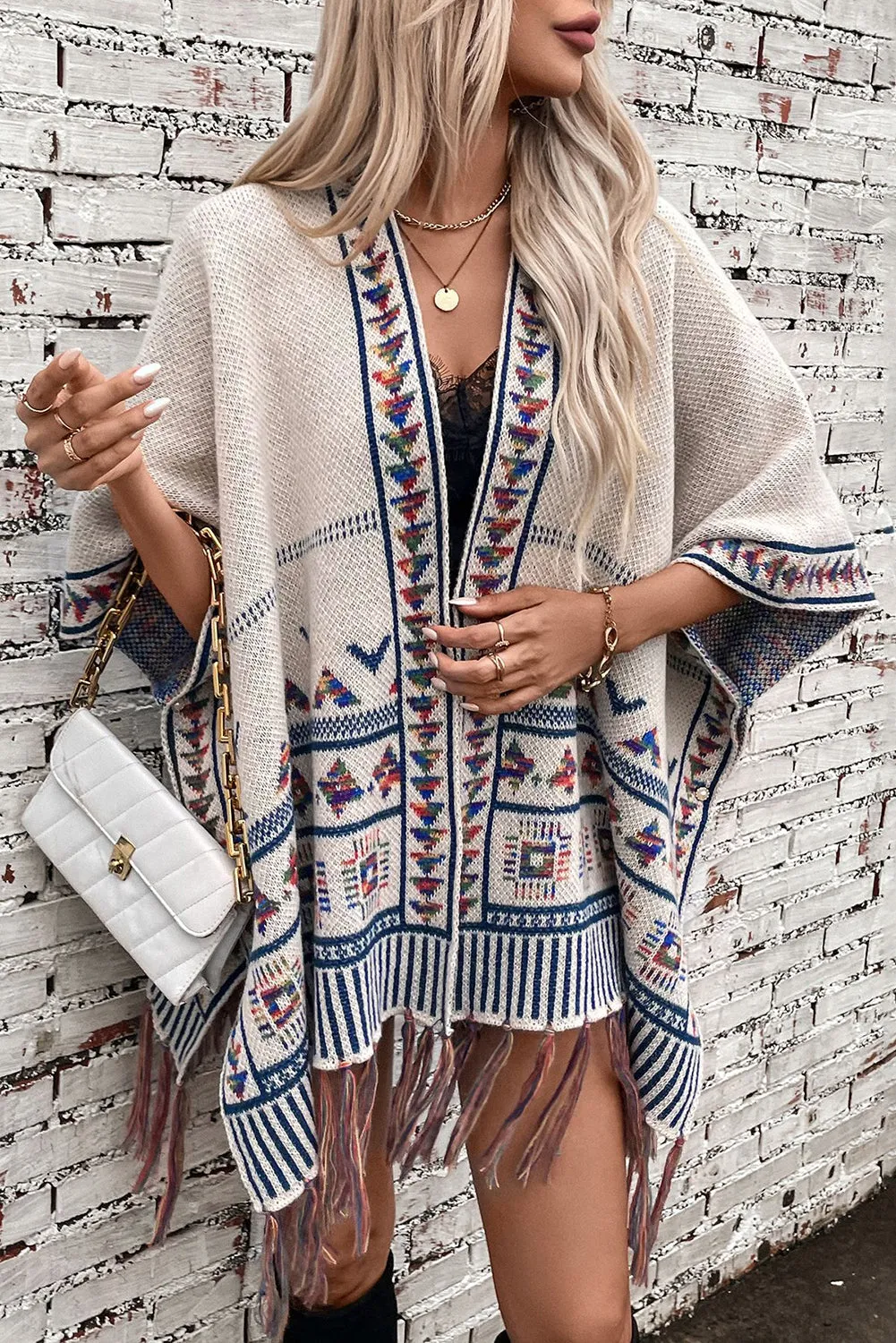 🌾 Beige Boho Geometric Tassel Hem Cape Poncho Cardigan: The Ultimate Piece for When You Want to Look Like You’re Living Your Best Boho Life, Even If You’re Still Figuring Out Adulting 🌾