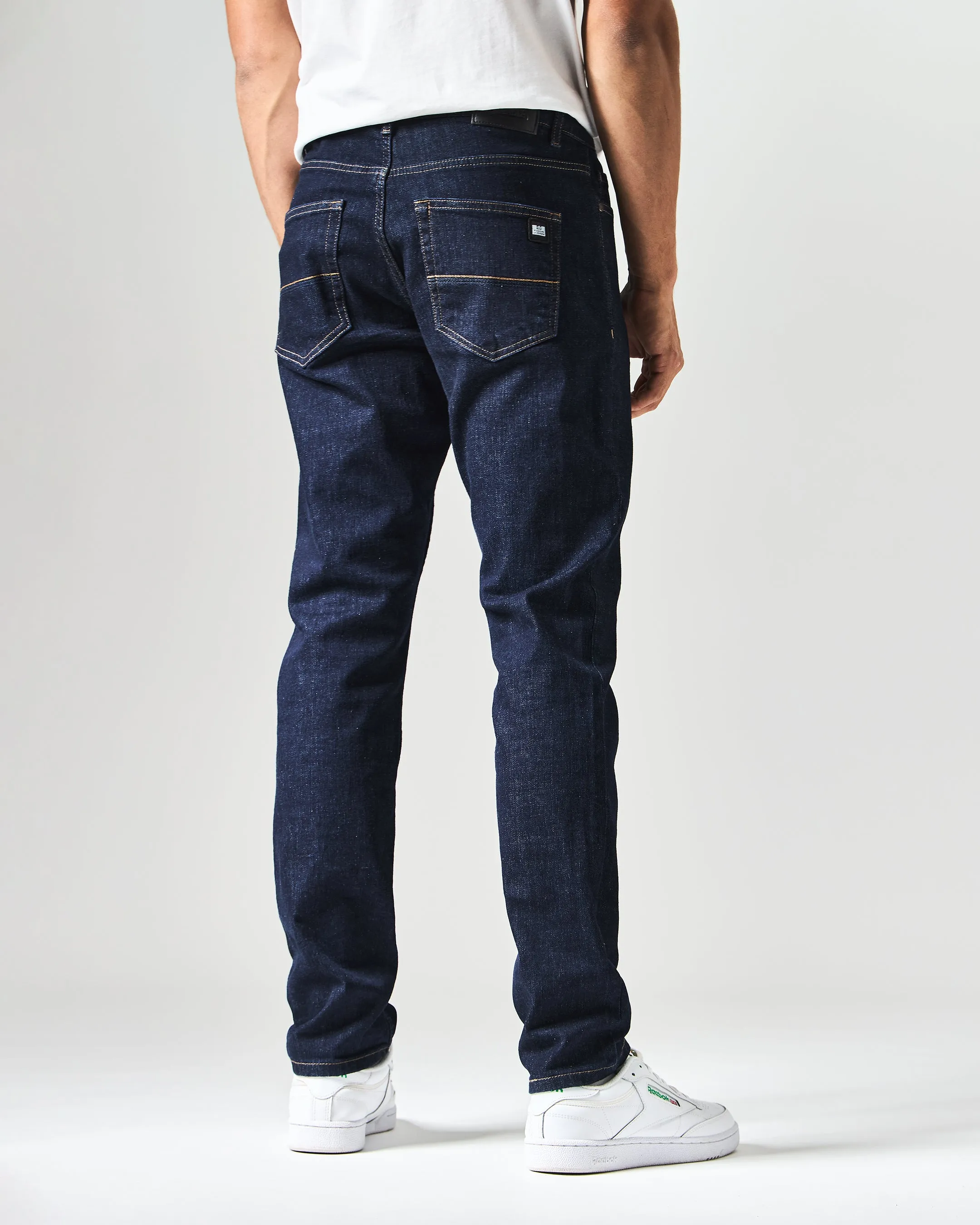 444 Tapered Dark Rinsed Denim Jeans