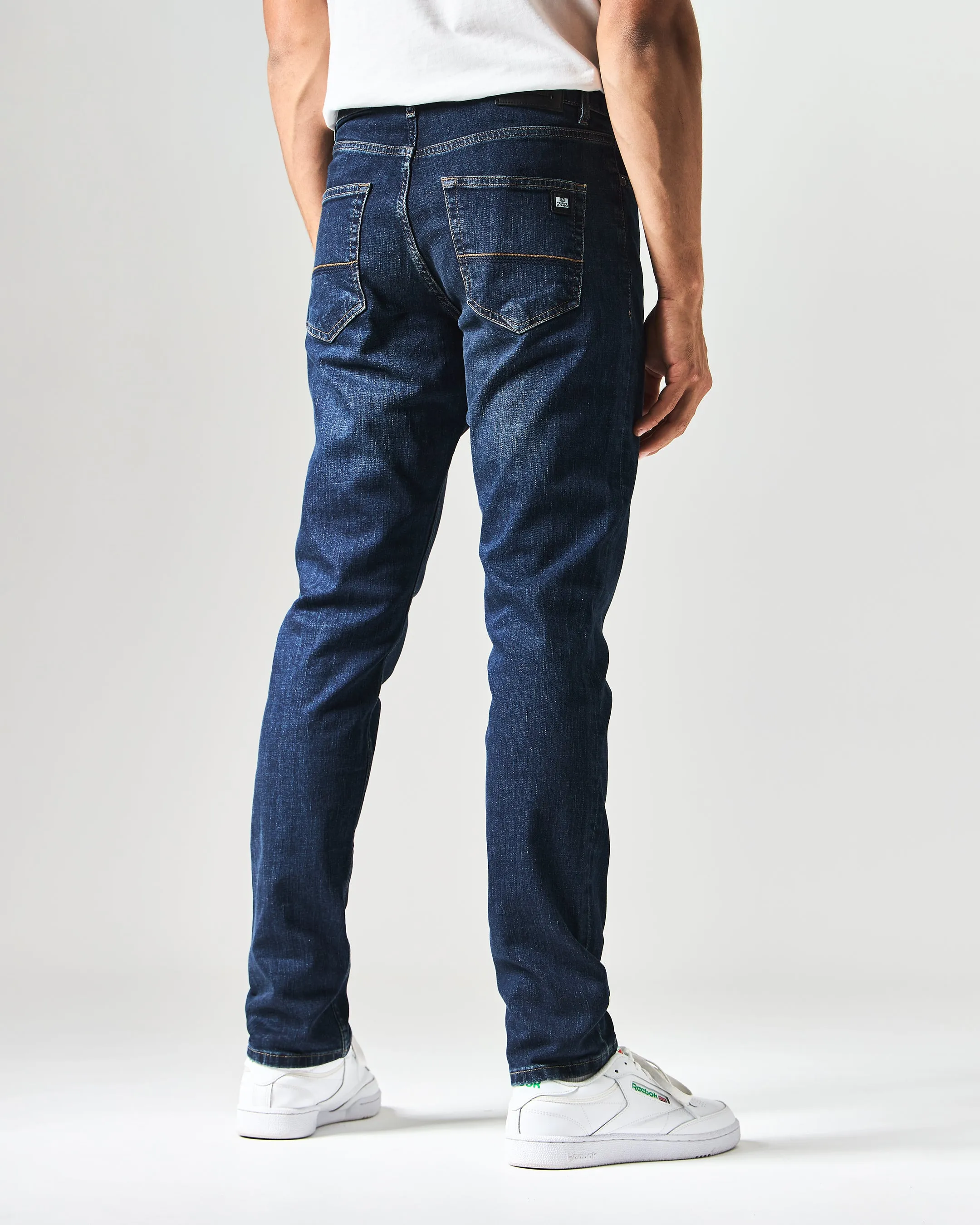 444 Tapered Dark Vintage Denim Jeans