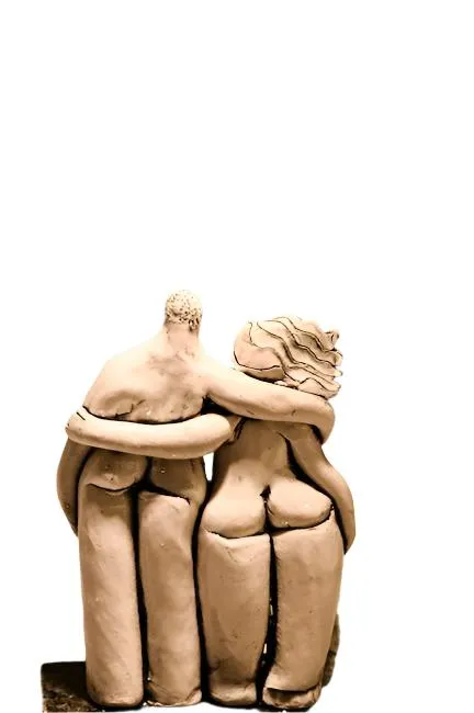 Adam, Eve, and Cat Sculpture