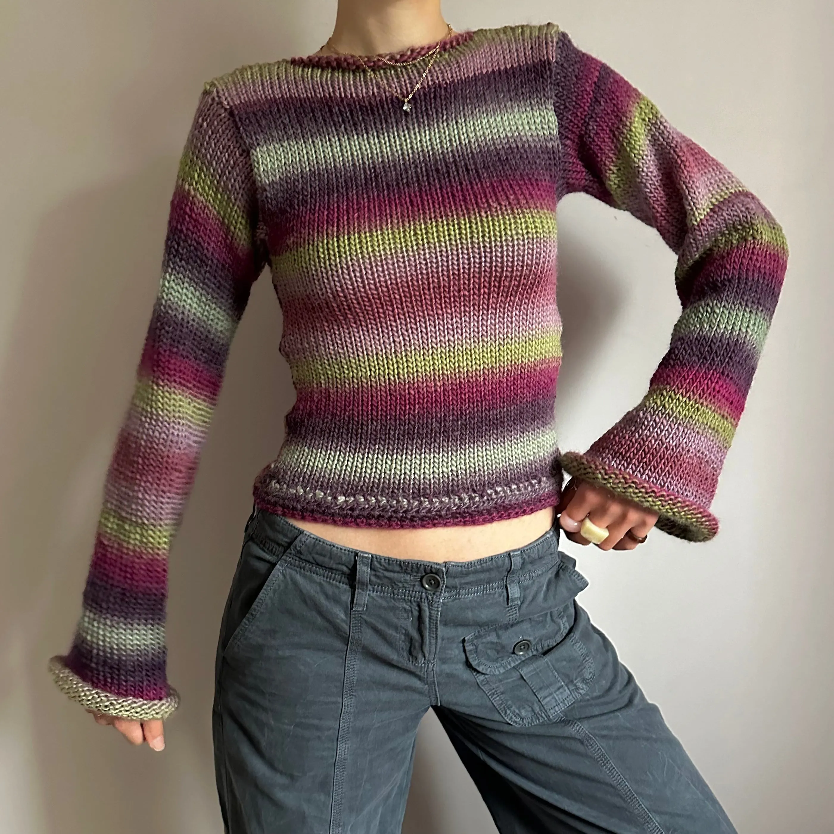 Handmade ombré knitted flared sleeve jumper in green and purple shades