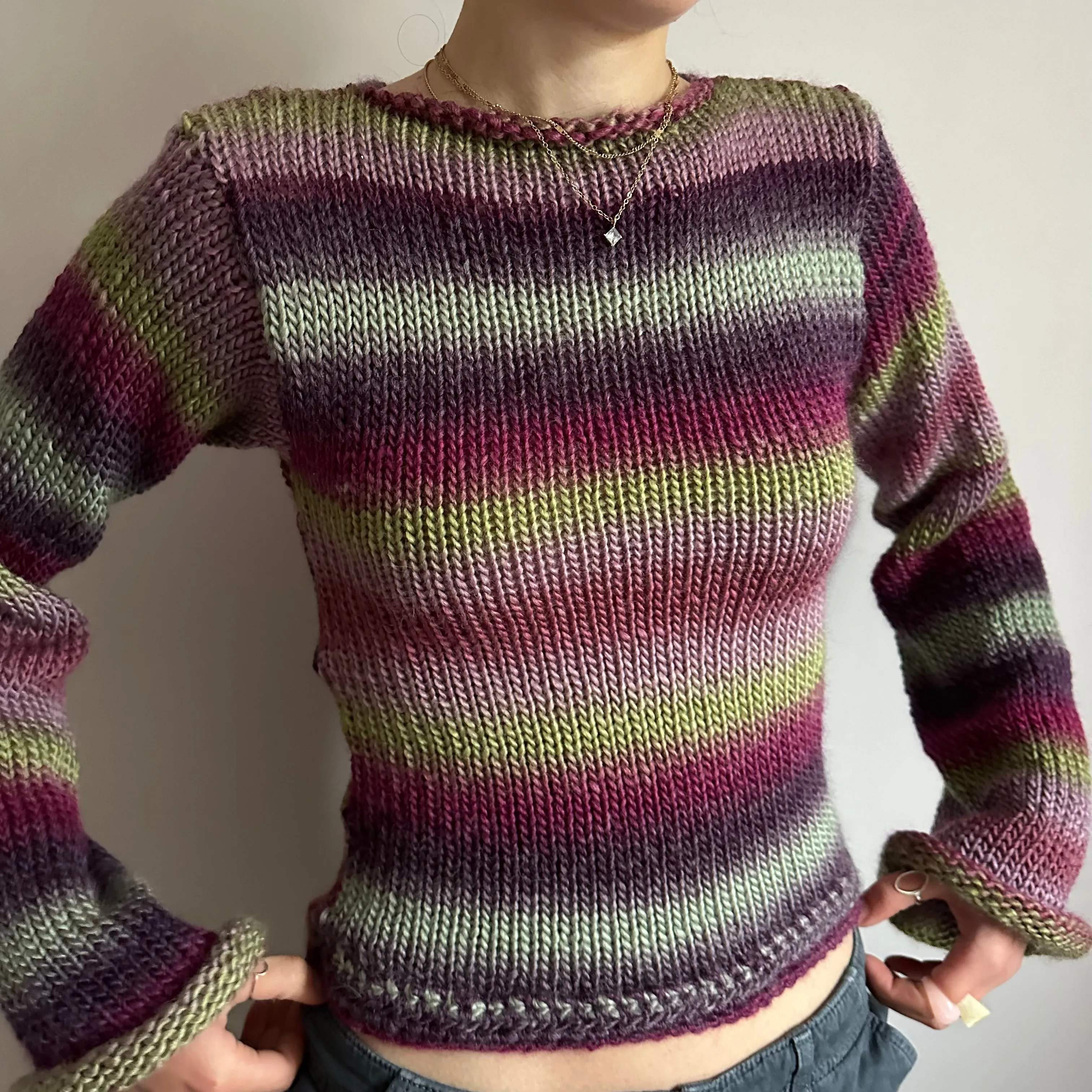 Handmade ombré knitted flared sleeve jumper in green and purple shades