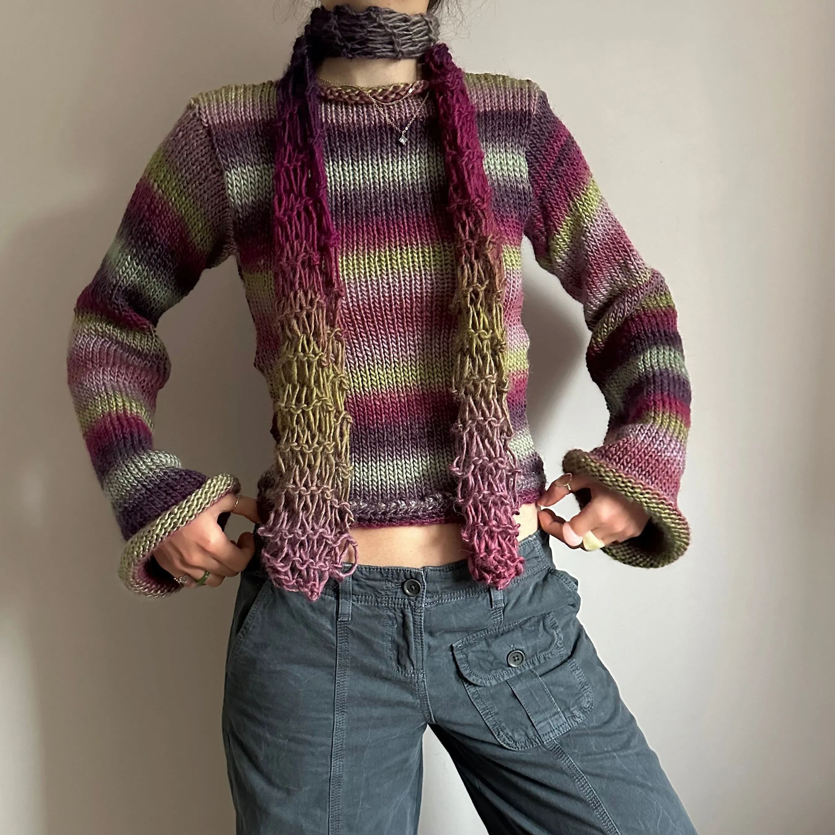 Handmade ombré knitted flared sleeve jumper in green and purple shades