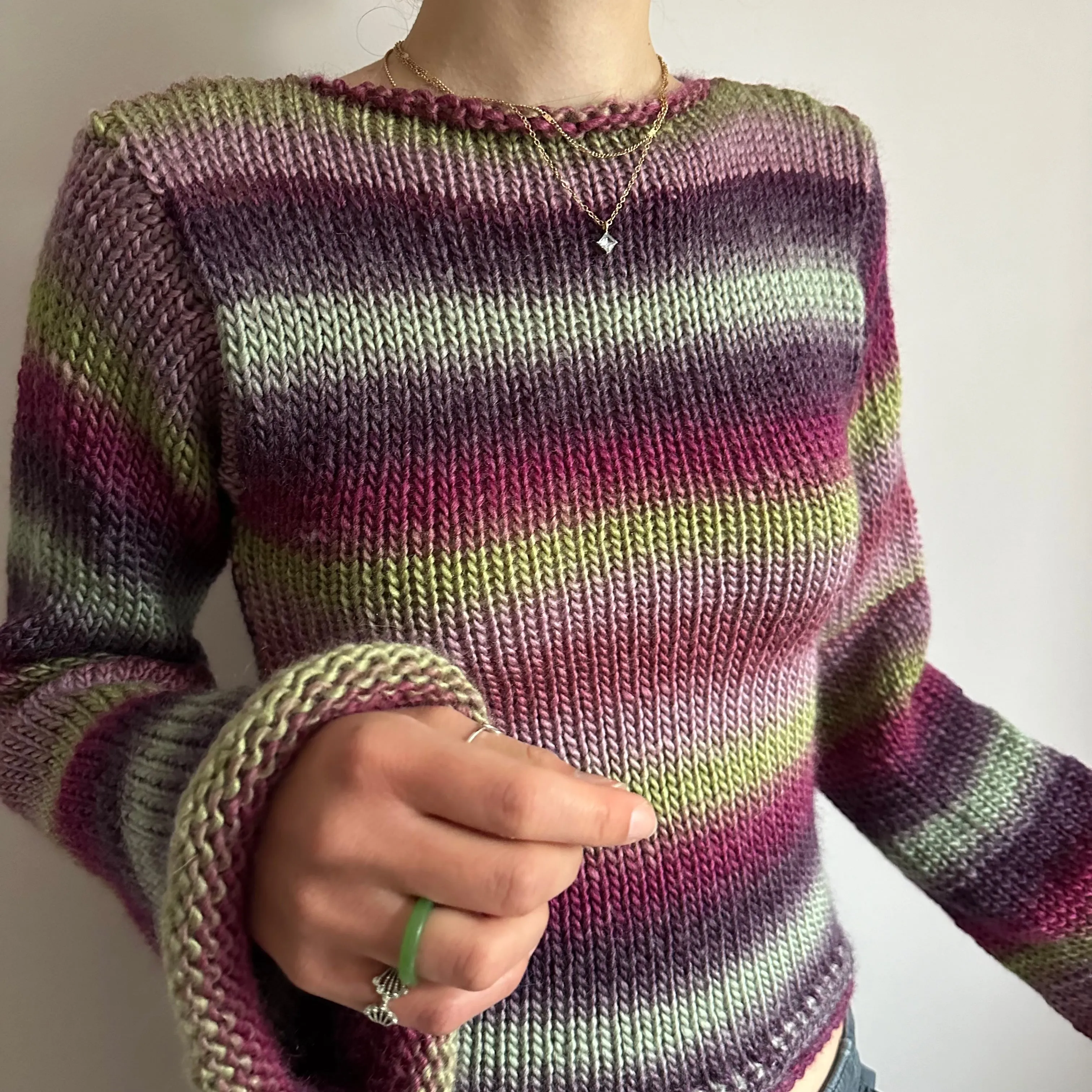 Handmade ombré knitted flared sleeve jumper in green and purple shades