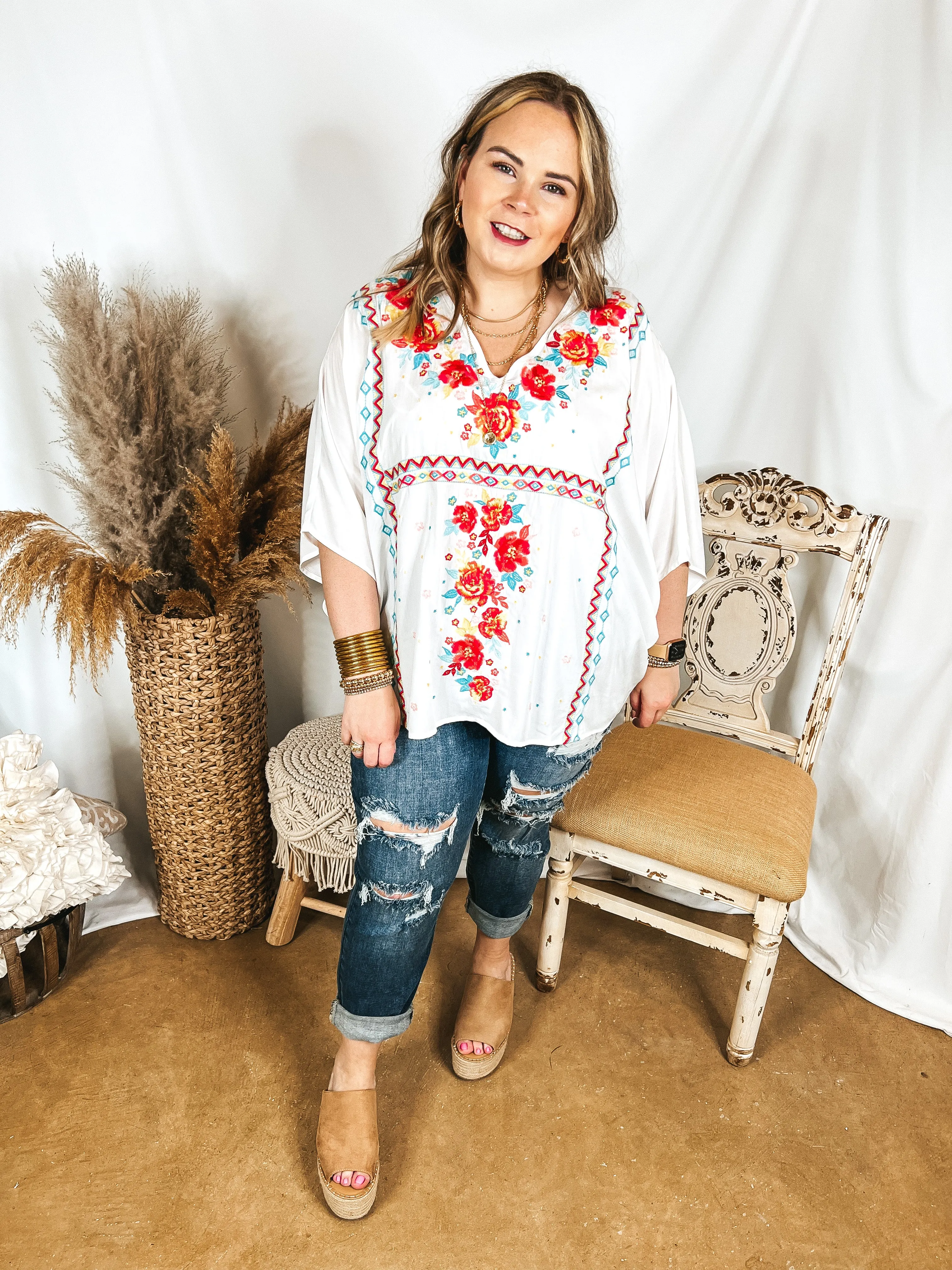 More To The Story Floral Embroidered Poncho Top in White